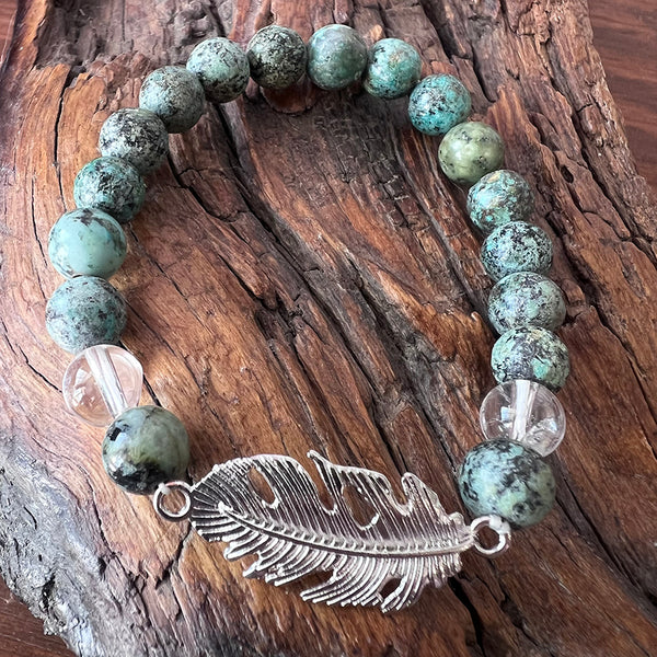 Bracelet African turquoise, clear quartz & feather