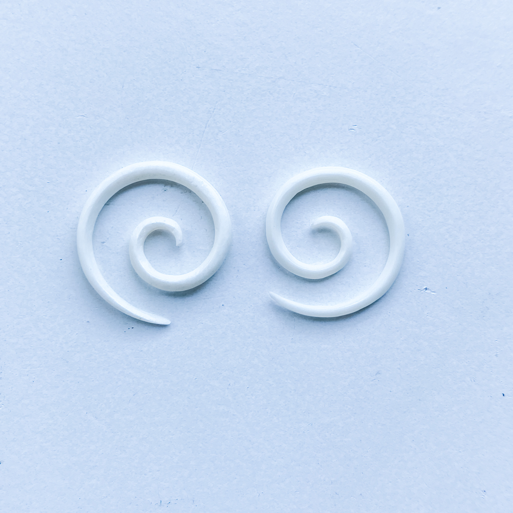 Earrings bone spiral stretcher