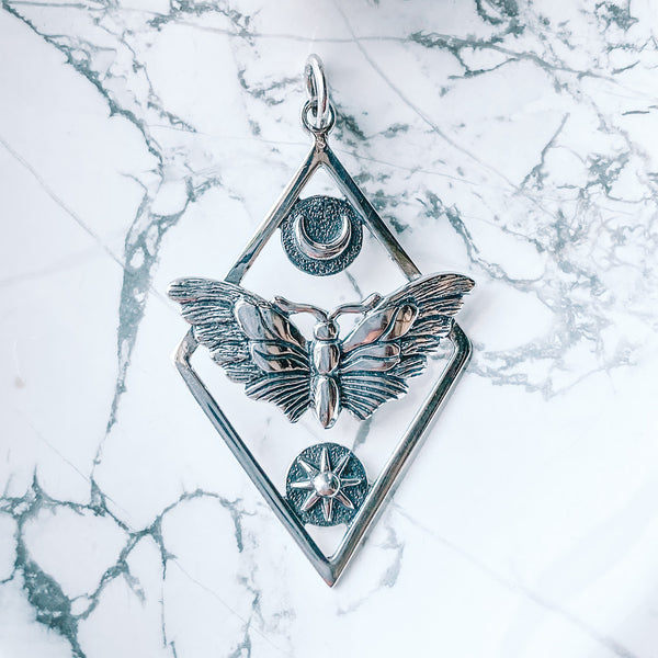 Pendant luna moth with sun/moon sterling silver