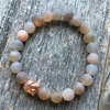 Bracelet 8mm matte moonstone with rose gold Buddha bead